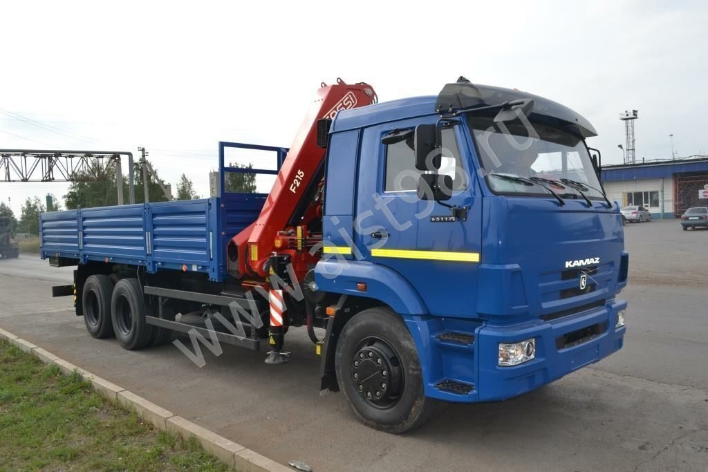 Бортовой КАМАЗ-65117 с КМУ Fassi F215A.0.22