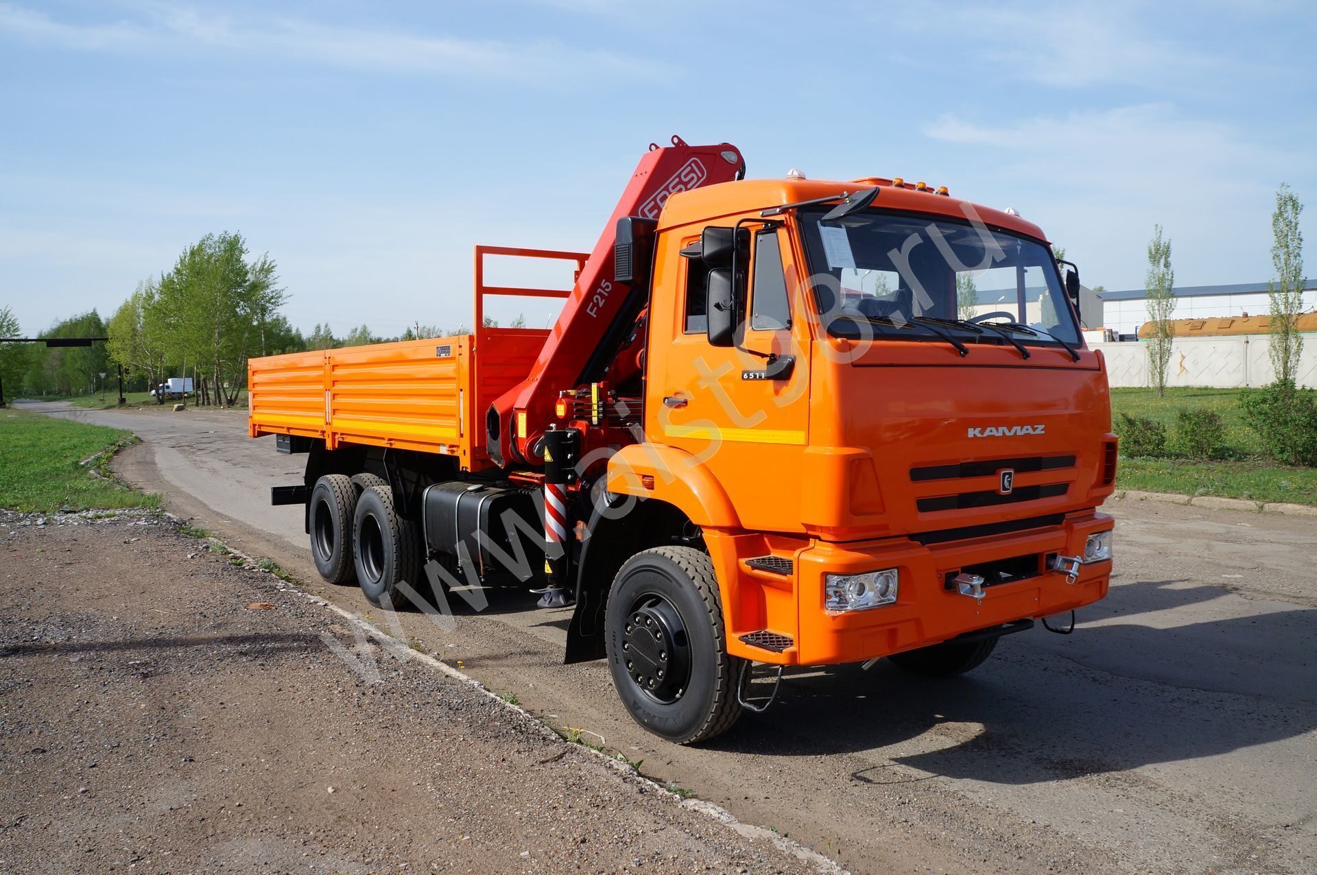 Бортовой КАМАЗ-65115 с КМУ Fassi F215A.0.22